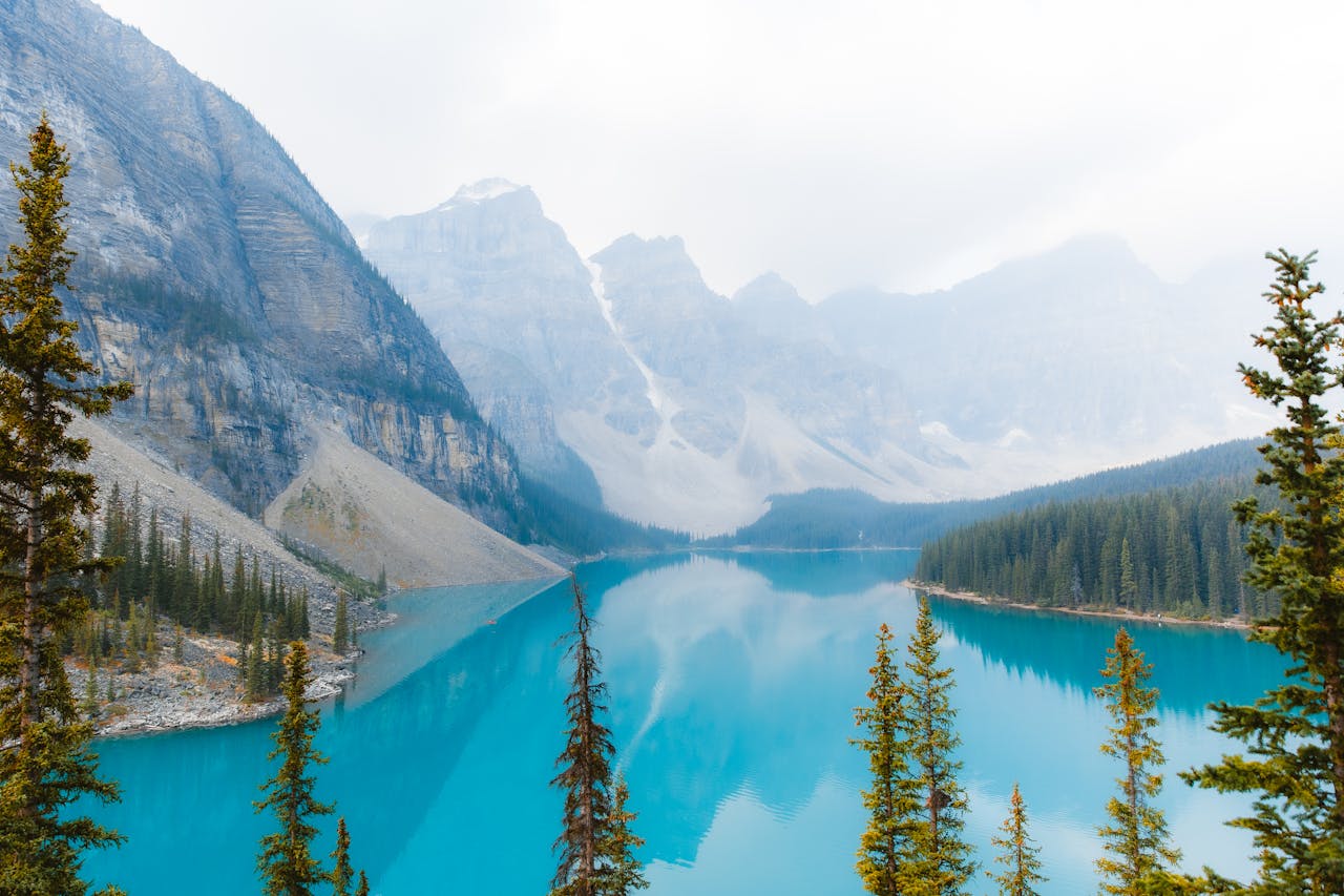 Captivating view of Moraine Lake in Banff National Park, showcasing turquoise waters and majestic mountains.
